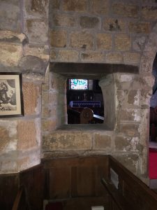 View of a hagioscope inside St. Andrew's Church, Ingleby Greenhow
